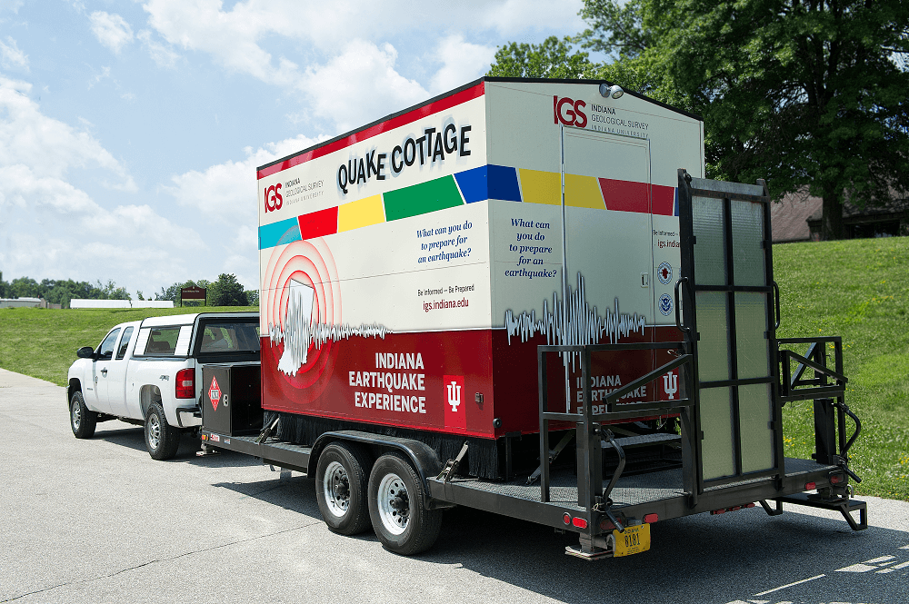 The Quake Cottage is a 14-foot-tall trailer that simulates the shaking experienced during an earthquake.