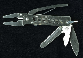 Tools such as a multipurpose tool, utility knife, or pliers