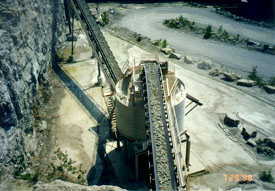 Photo showing crushed stone conveyor.